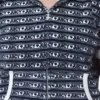 Bluza z kapturem na zamek, z krótkim rękawem i paskiem z logo w szortach Bluza z kapturem na zamek, z krótkim rękawem i paskiem z logo w szortach