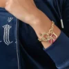 Bransoletka z kamieniem w kształcie serca i zawieszką „J” Bransoletka z kamieniem w kształcie serca i zawieszką „J”