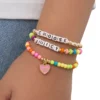 Dzieci wybierają zestaw 3 elastycznych bransoletek z koralikami i zawieszką w kształcie serca Juicy Dzieci wybierają zestaw 3 elastycznych bransoletek z koralikami i zawieszką w kształcie serca Juicy